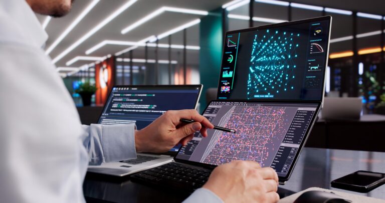 Ilustrasi workstation komputer 2026 dengan multi monitor, setup profesional, dan sistem AI computing berwarna biru futuristik.